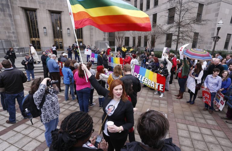 Ahead of a Supreme Court hearing next week that could pave the way for same sex marriages nationwide, 61 percent of Americans now say gays and lesbians should be allowed to wed legally, according to a new ABC News/Washington Post poll. (AP Photo)