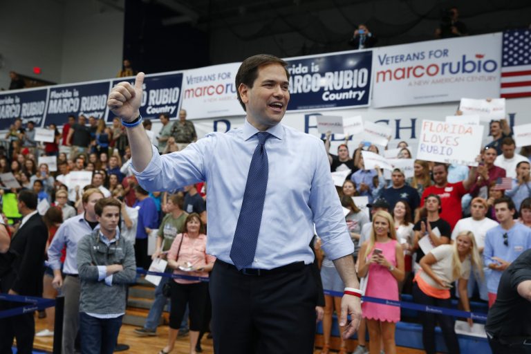 Rubio's Senate staff gave him a hearty welcome back to work. (AP Photo/Paul Sancya)
