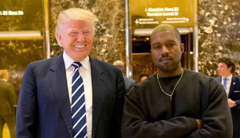 FILE - In this Dec. 13, 2016, file photo, President-elect Donald Trump and Kanye West pose for a picture in the lobby of Trump Tower in New York. West has deleted tweets posted on Dec. 13, 2016, explaining the meeting.