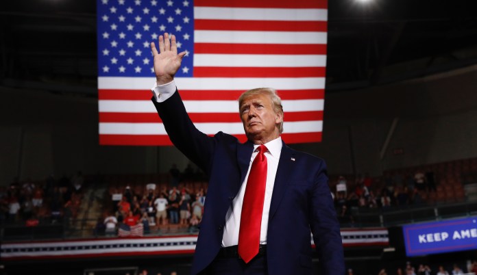 President Donald Trump reacts at the end of his speech at a campaign rally, Thursday, Aug. 15, 2019, in Manchester, N.H. 