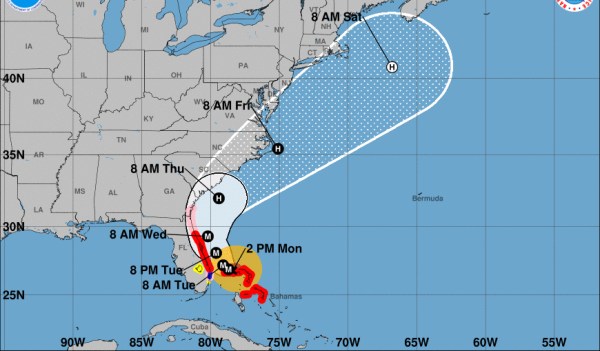 Hurricane Dorian expands in size as it stalls over Bahamas and eyes Florida coast