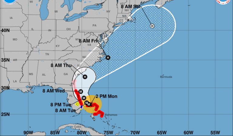 Hurricane Dorian expands in size as it stalls over Bahamas and eyes Florida coast