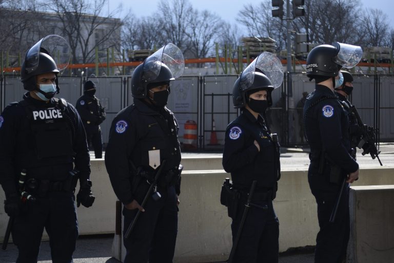 Chaos of Trump inauguration contrasts the quiet of Biden’s