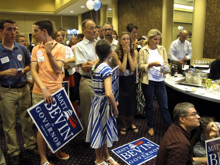 Supporters of Republican candidate for governor Matt Bevin express shock while watching primary race returns in Louisville, Ky., Tuesday, May 19, 2015. Bevin is locked in a tight race with Republican James Comer. (AP Photo/Dylan Lovan)