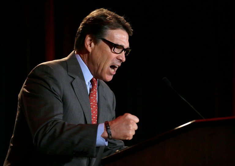 Governor Rick Perry made his endorsement of Ted Cruz official Monday morning after dropping out of the race in September amid fundraising challenges and an inability to get himself on the main debate stage. (AP Photo/Tony Gutierrez)