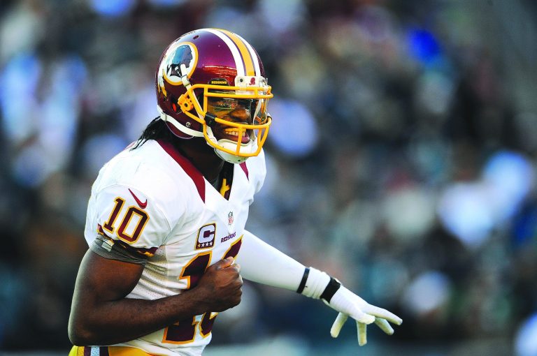 Patrick McDermott/Getty Images
Robert Griffin III completed 16 of 24 passes for 198 yards, two touchdowns and an interception in the Redskins' win Sunday.