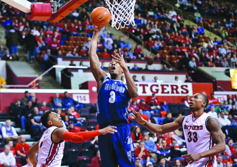 Mel Evans/AP
Mikael Hopkins scored a career-high 14 points in 32 minutes as Georgetown pulled away late to beat Rutgers on Saturday.