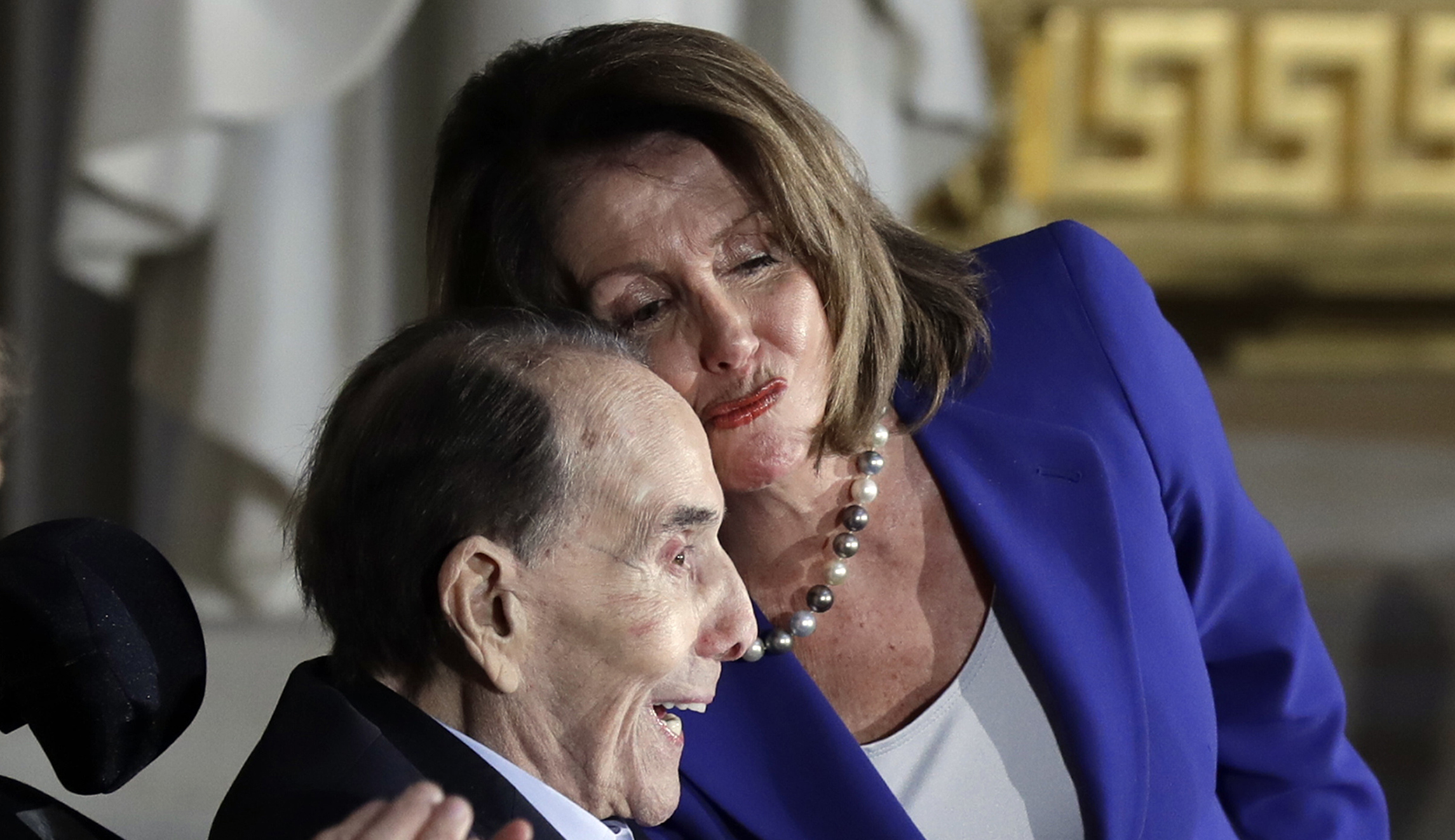 Nancy Pelosi asks audience to clap during her speech honoring Bob Dole