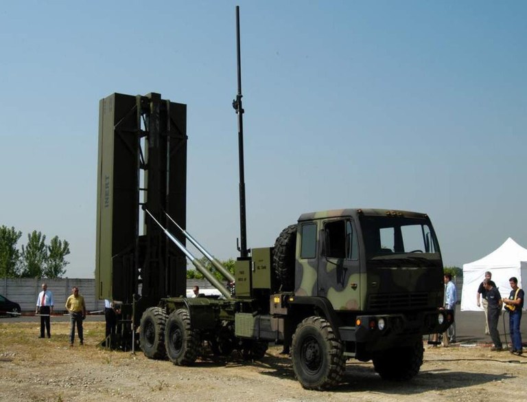MEADS advanced lightweight launcher is capable of loading and unloading a 6-ton flatrack of 12 PAC-3 missiles and elevating them to a 90-degree angle for launch. (PRNewsFoto/Lockheed Martin)