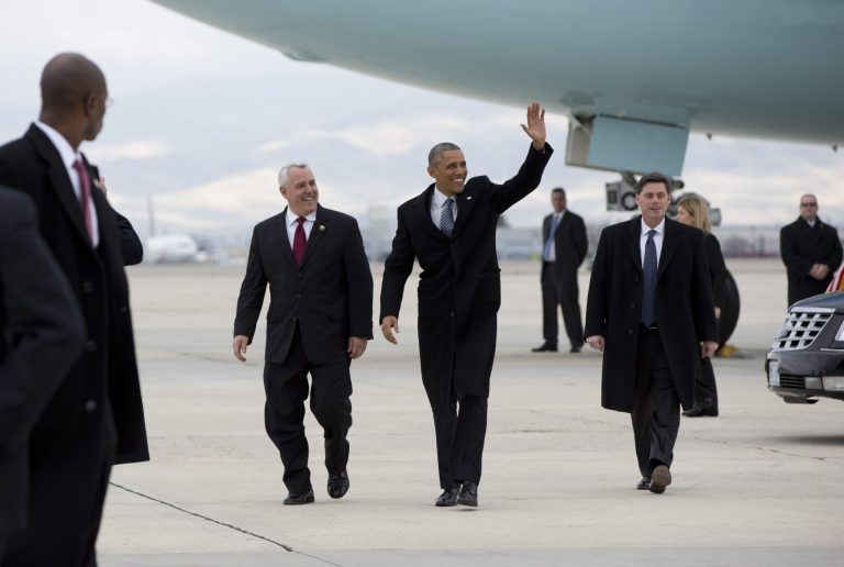 President Obama walks on the tarmac with Mayor David Bieter after arriving on Air Force One, Wednesday, Jan. 21, 2015, in Boise , Idaho, en route to Boise State University where he will discuss the themes in his State of the Union address. (AP Photo/Carolyn Kaster)