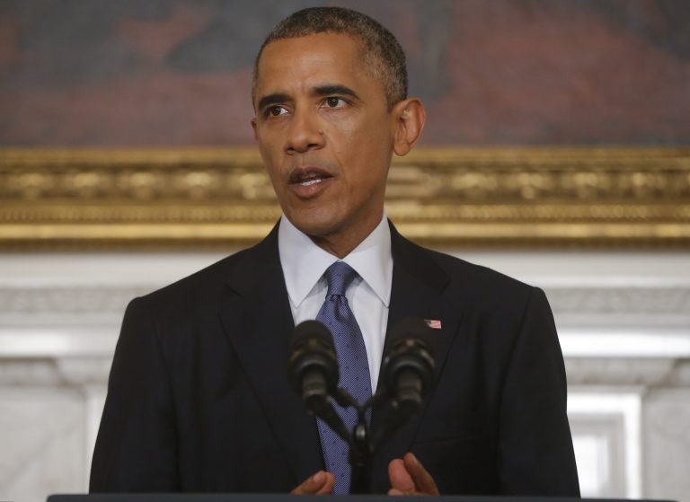 President Barack Obama speaks about the situation in Iraq in the State Dining Room at the White House in Washington, Thursday, Aug. 7, 2014. (AP Photo/Charles Dharapak)