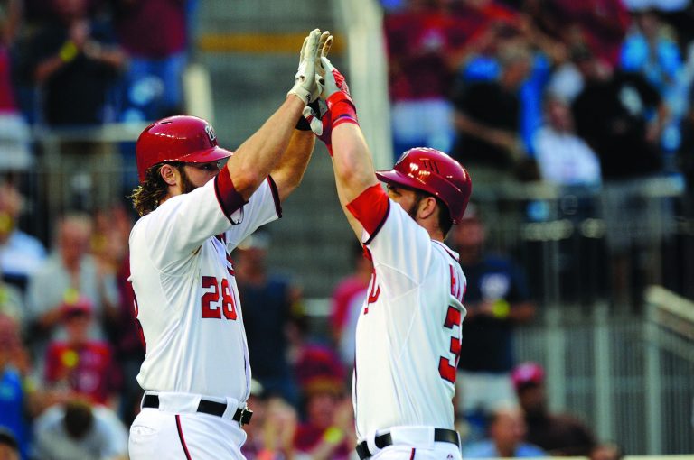 Patrick McDermott/Getty Images
The Nationals' Bryce Harper, right, hit a two-run homer that scored Jayson Werth in Thursday's win over the Cardinals.