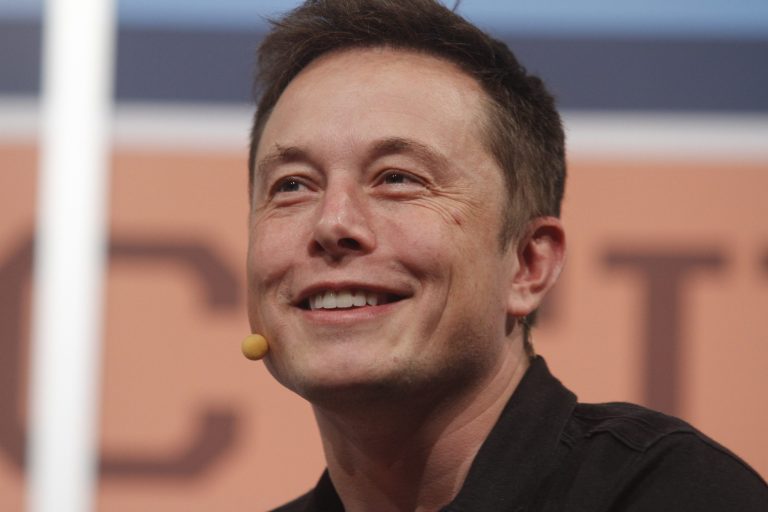 Elon Musk, CEO of SpaceX, said Friday that his company would file a lawsuit to protest a satellite launch contract the Air Force awarded to a joint Lockheed Martin and Boeing venture. (AP Photo)