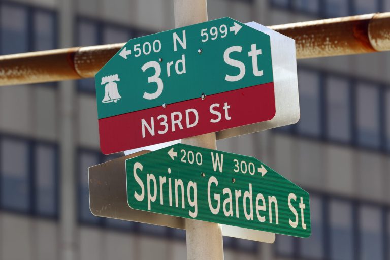 In this Wednesday, April 16, 2014 photo, shown are the signs for North 3rd Street and Spring Garden in Philadelphia.  The City of Brotherly Love has become home to a growing and tightly knit community of entrepreneurs and startups.  At the same time, Philadelphia-based Comcast plans to build a $1.2 billion skyscraper downtown with the potential to house thousands of corporate tech jobs.  (AP Photo/Matt Rourke)