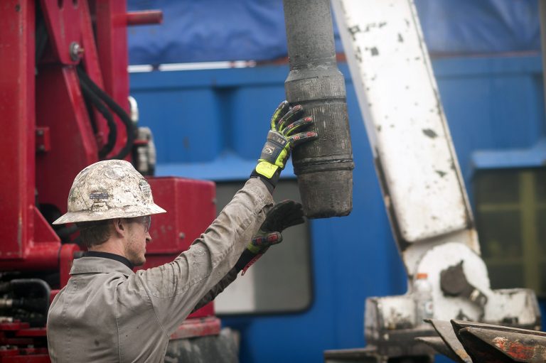 A rig hand removes drill pipe from a natural gas wellÂ atop the Marcellus shale rock formation, a hydraulic fracturing site in Washington Township, Pennsylvania. (Bloomberg)