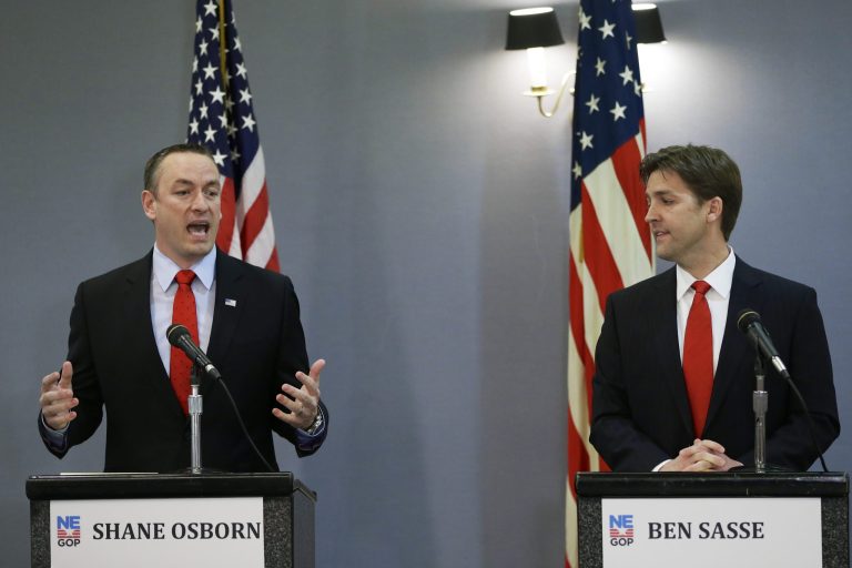 Former State Treasurer Shane Osborn and Midland University President Ben Sasse participate in a debate in Omaha, Neb., on March 11.ÃÂ FreedomWorks announced this afternoon that it is rescinding its endorsement of Osborn and will instead support Sasse.ÃÂ (AP Photo/Nati Harnik)