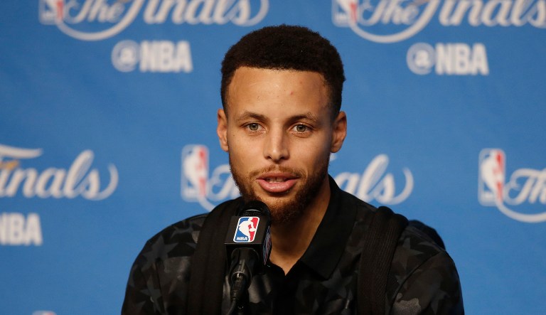 President Trump says the invitation given to Golden State guard Stephen Curry (pictured) has been rescinded after the NBA player said he did not want to join his championship-winning team's visit to the White House.