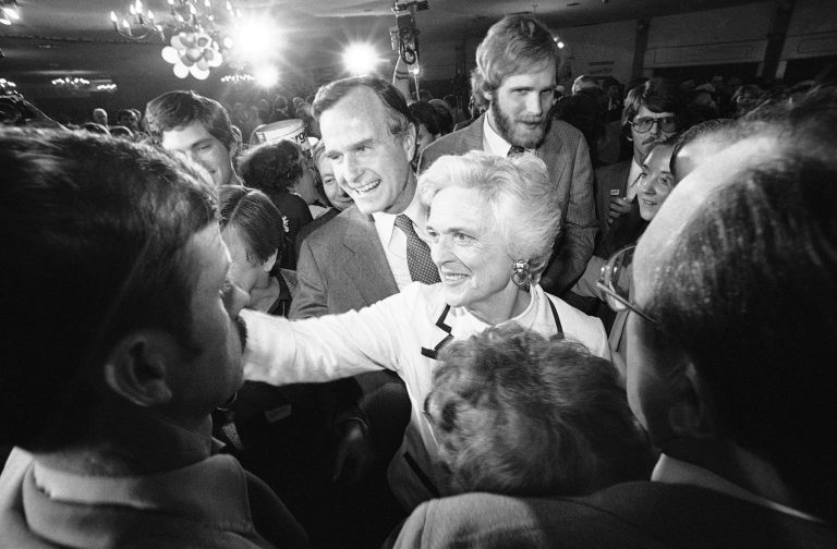 Former CIA director George Bush and his wife, Barbara, smile and shake hands with supporters as Bush left a Concord hotel ballroom after he spoke with supporters in Concord on Tuesday, Feb. 26, 1980. Bush, who was seeking the Republican presidential nomination, received 22 percent of the vote, while rival Ronald Reagan received 52 percent. (AP Photo)