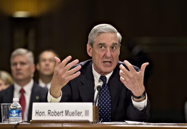 Judge who reviewed full Mueller report asks DOJ about 'merits' of redactions