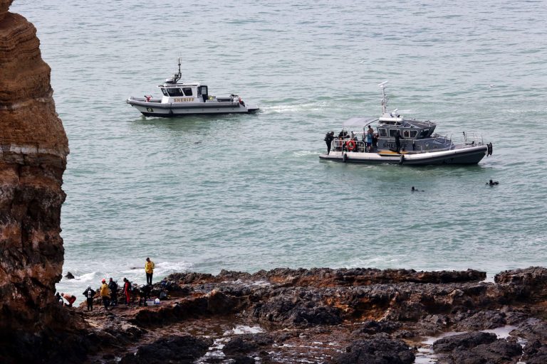 Rescuers search the water below Inspiration Point in Rancho Palos Verdes, Calif. on Thursday, July 10, 2014 for a missing swimmer who disappeared Wednesday, July 9, 2014. Rescue divers have resumed searching a small, rocky ocean cove near Los Angeles for the 19-year-old man who disappeared while swimming with friends. (AP Photo/Daily Breeze, Chuck Bennett)