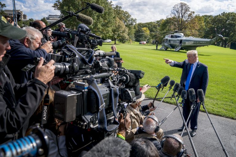 President Donald Trump calls on a reporter before boarding Marine One on the South Lawn of the White House in Washington, Wednesday, Oct. 25, 2017, for a short trip to Andrews Air Force Base, Md. and then on to Dallas. (AP Photo/Andrew Harnik)