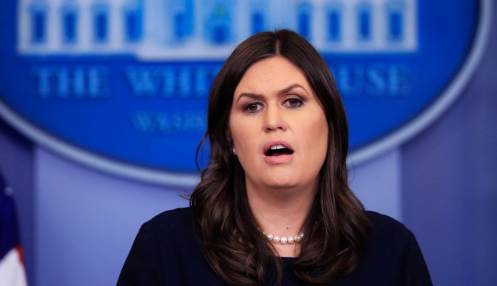 White House press secretary Sarah Sanders said that NBC would never have given President Trump a starring roll on "The Apprentice" if he was a racist. She said, "Frankly, if the critics of the president were who he said he was, why did NBC give him a show for a decade on TV?" (AP Photo/Manuel Balce Ceneta)