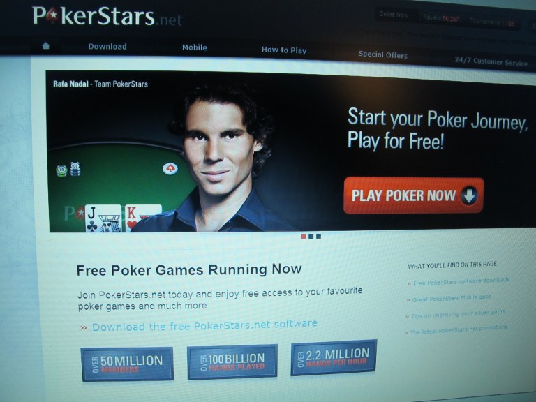 A computer screen in Atlantic City, N.J., shows the home page of the PokerStars website. (AP Photo/Wayne Parry)