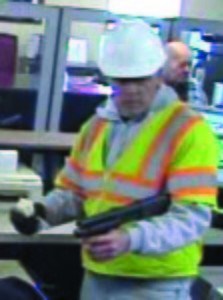 Man dressed as construction worker robs bank at gunpoint