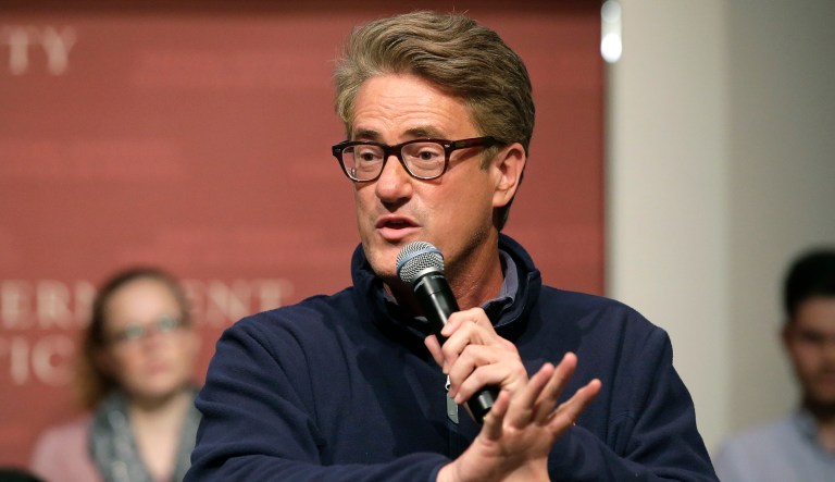 "They're going to die, and then you're going to be left holding the bill," Joe Scarborough said of Baby Boomers and Gen Xers. (AP Photo/Steven Senne)