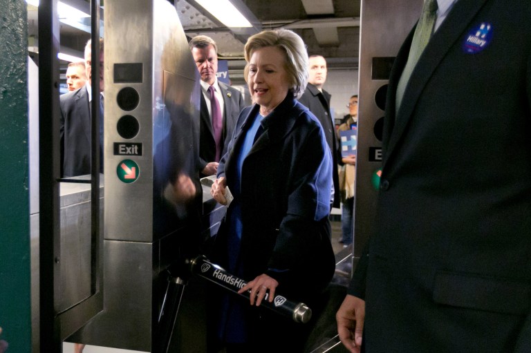 Democratic presidential candidate Hillary Clinton failed to successfully swipe through the NYC subway, not once but five times. (AP Photo/Richard Drew)