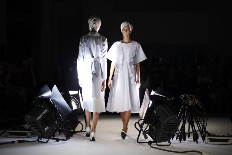 Models present creations by Japan's fashion designer Kunihiko Morinaga for Anrealage's Spring-Summer 2015 ready-to-wear fashion collection presented in Paris, France, Tuesday, Sept. 23, 2014. (AP Photo/Francois Mori)