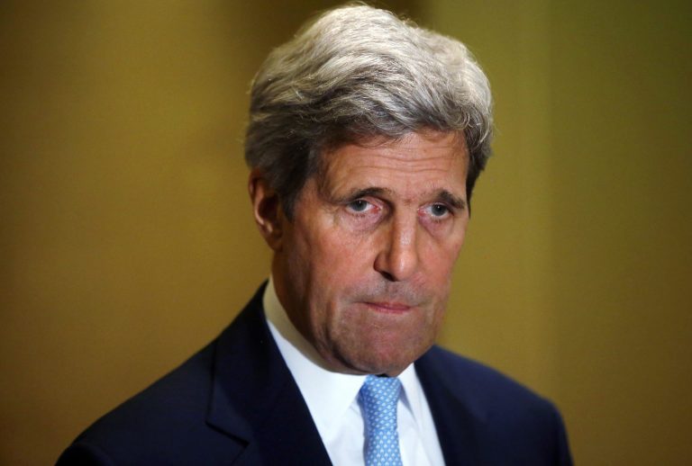 U.S. Secretary of State John Kerry listens as U.N. Secretary-General Ban Ki-moon makes a statement regarding the violence in Gaza during their meeting in Cairo, Thursday, July 24, 2014. Israeli tank shells hit a compound housing a U.N. school in the Gaza Strip on Thursday, killing at least 15 people and wounding dozens who were seeking shelter from fierce clashes on the streets outside, Palestinian officials said, as Israel pressed forward with its 17-day war against the territory's Hamas rulers.(AP Photo/Pool)