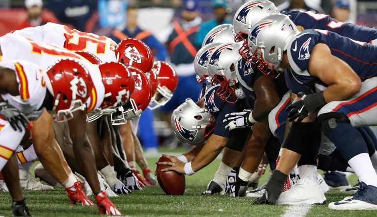 The Kansas City Chiefs and the New England Patriots at the line of scrimmage for the snap during an NFL football game at Gillette Stadium in Foxborough, Mass. Thursday, Sept. 7, 2017. (Winslow Townson/AP Images for Panini)