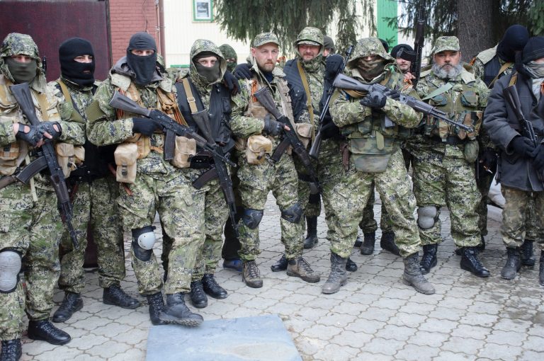 Armed pro-Russian activists pose for a photo after they occupied the police station in the eastern Ukraine town of Slovyansk. (AP Photo/Maxim Dondyuk, Russian Reporter magazine)