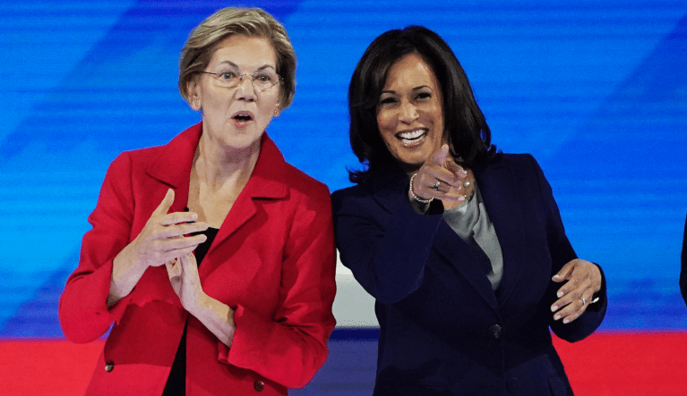 Democratic presidential candidate Sen. Elizabeth Warren, D-Mass., left and Democratic presidential candidate Sen. Kamala Harris, D-Calif. react to the audience Thursday, Sept. 12, 2019, before a Democratic presidential primary debate hosted by ABC at Texas Southern University in Houston. (AP Photo/David J. Phillip)