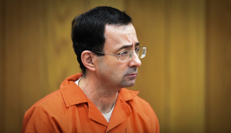 Nassar — enabled by the U.S. Olympic Committee, USA Gymnastics, and Michigan State University — abused his position of power to molest hundreds of girls. (Matthew Dae Smith/Lansing State Journal via AP)