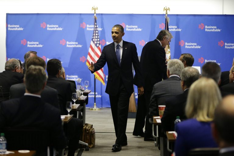   President Barack Obama walks over to shake hands with business leaders before speaking about the fiscal cliff during an address before the Business Roundtable, an association of chief executive officers, Wednesday, Dec. 5, 2012, in Washington. (AP Photo/Charles Dharapak)  