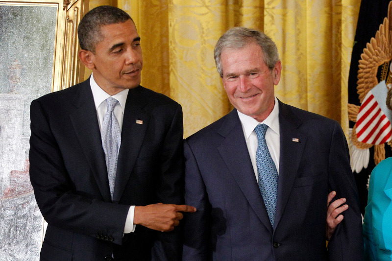 Obama jabs Bush at portrait hanging