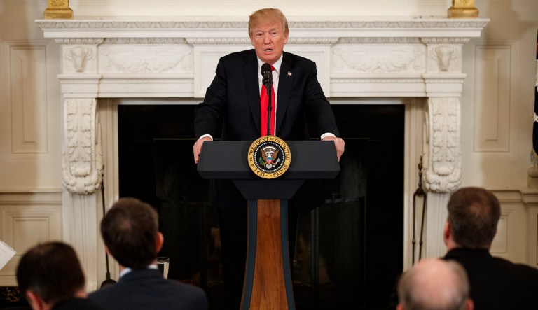 President Trump said that 32 solar panel plants that had either been closed or placed on life support are now coming back due to the tariff protections. (AP Photo/Evan Vucci)