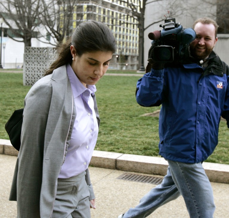 Lauren Weiner, left, a former Democratic Senatorial Campaign Committee staffer, leaves federal court in Washington in March 2006. Weiner pleaded guilty to snooping on then-Maryland Lt. Gov. Michael Steele. (AP Photo/Chris Gardner)