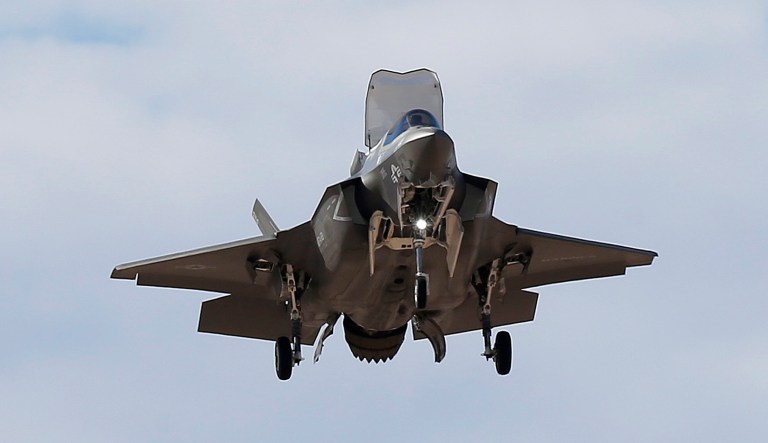 An F-35B fighter jet, the U.S. Marine Corps variant of the F-35 from the Marine Corps Air Station in Yuma, Ariz., flies into Luke Air Force Base Tuesday, Dec. 10, 2013, in Goodyear, Ariz. The new jet shows off its abilities at the request of senior defense officials from Singapore, who are visiting Luke AFB as part of Forging Sabre, a Singapore armed forces exercise taking place at Luke and at the Barry M. Goldwater training range. 