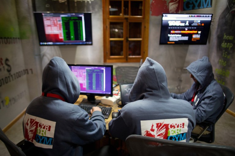 Trainees work in front of their computers at the 