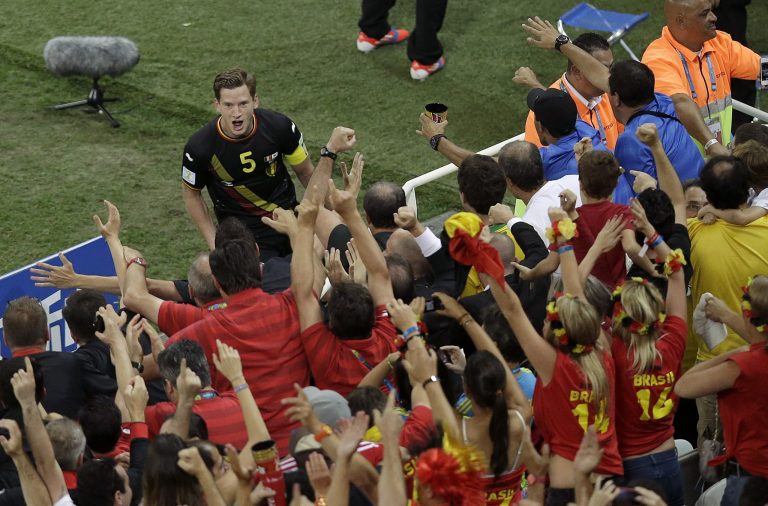 Belgium's Jan Vertonghen (5) gets congratulated by fans after he scored during the group H World Cup soccer match between South Korea and Belgium at the Itaquerao Stadium in Sao Paulo, Brazil, Thursday, June 26, 2014. (AP Photo/Andrew Medichini)