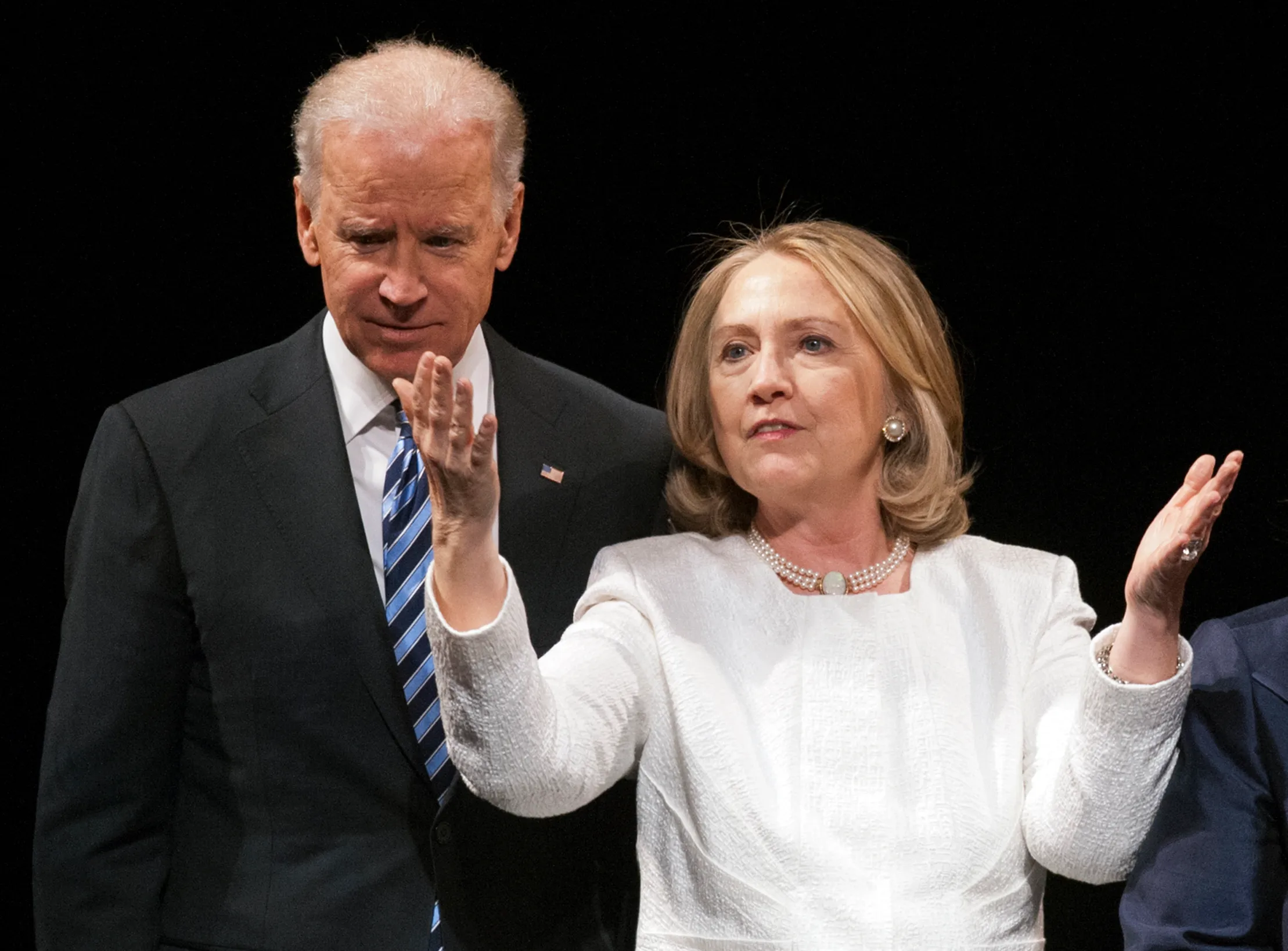 Biden challenges Clinton to back TPP as Obama sends it to Congress