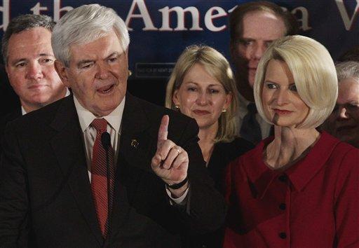 Republican presidential candidate and former House Speaker Newt Gingrich speaks during a South Carolina Republican presidential primary night rally, Saturday, Jan. 21, 2012, in Columbia, S.C. Callista Gingrich looks on at right. (AP Photo/Paul Sancya)
