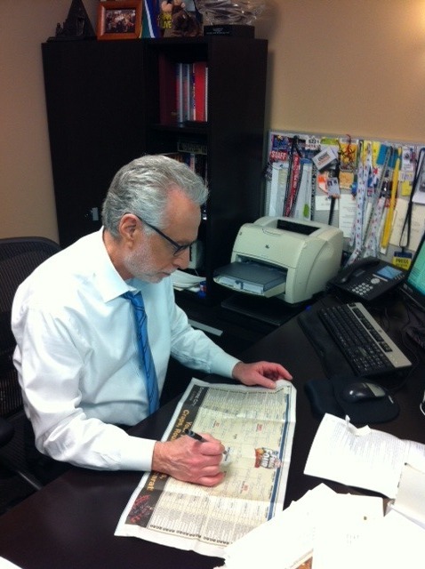 CNN Situation Room anchor Wolf Blitzer filling out his NCAA brackets.