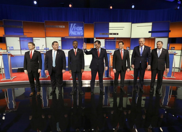 Presidential candidates Rand Paul, Chris Christie, Ted Cruz, Marco Rubio, Jeb Bush and John Kasich appear before the Republican presidential primary debate. (AP Photo/Chris Carlson)