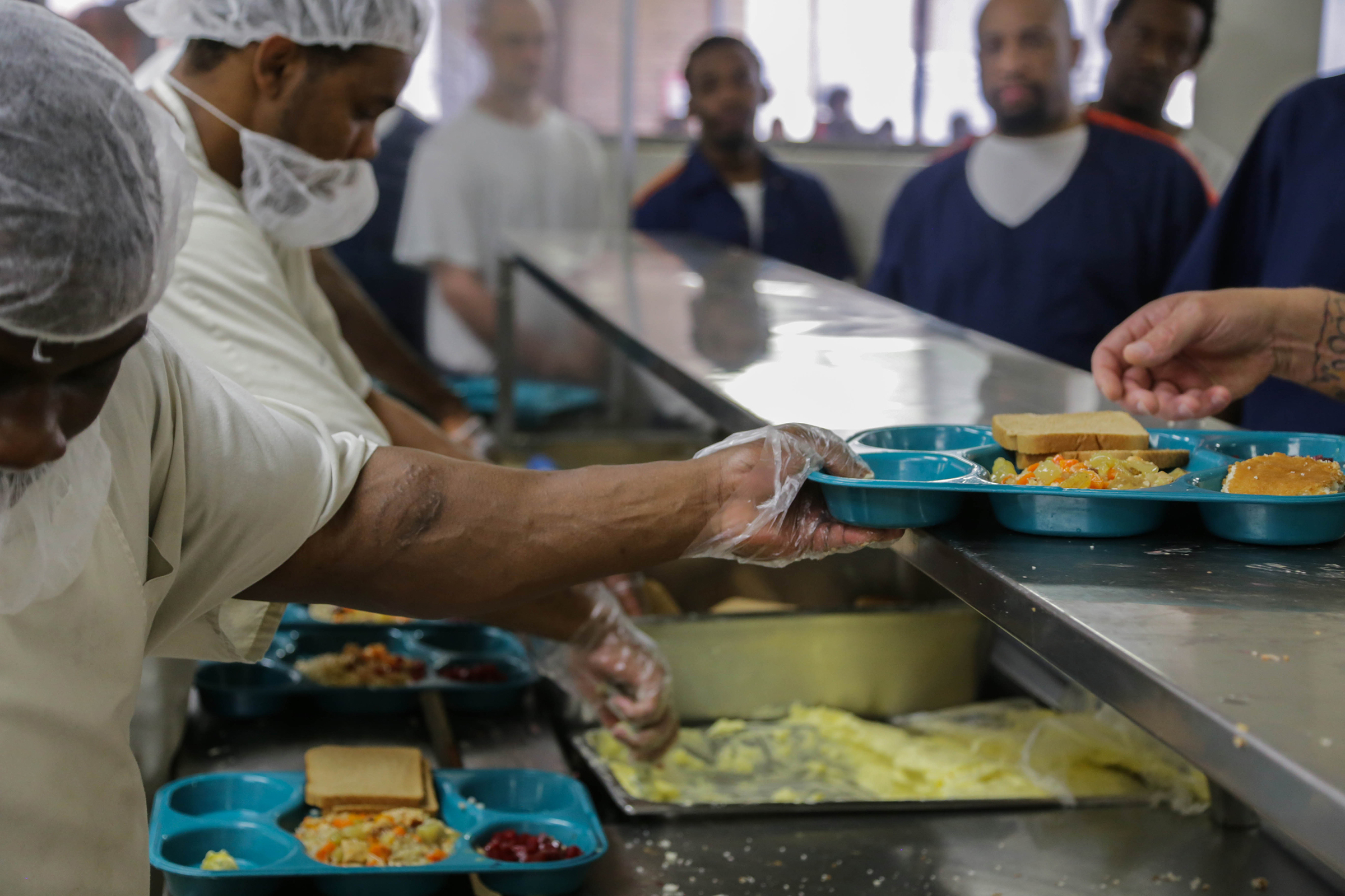 Michigan prison food contractor boosts pay, staff