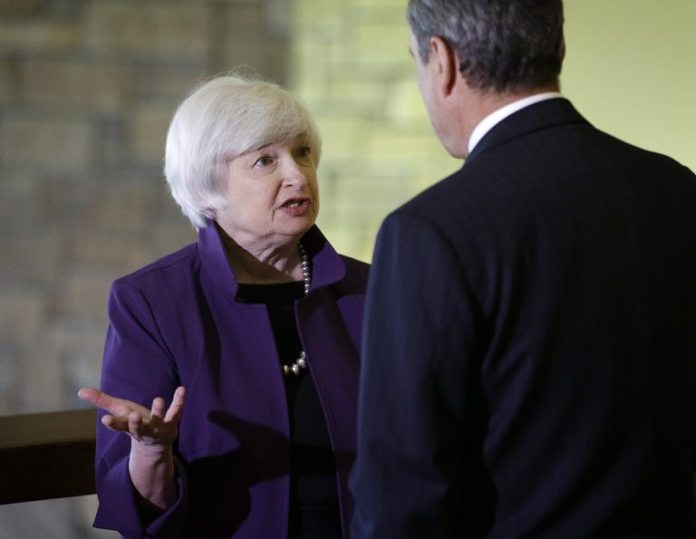 Federal Reserve Chair Janet Yellen, left, and European Central Bank President Mario Draghi speak during the Jackson Hole Economic Policy Symposium at the Jackson Lake Lodge in Grand Teton National Park near Jackson, Wyo. Friday, Aug. 22, 2014. (AP Photo/John Locher)