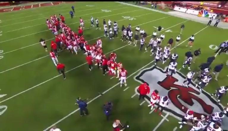 Fans boo as Chiefs and Houston Texans players lock arms in solidarity for social justice